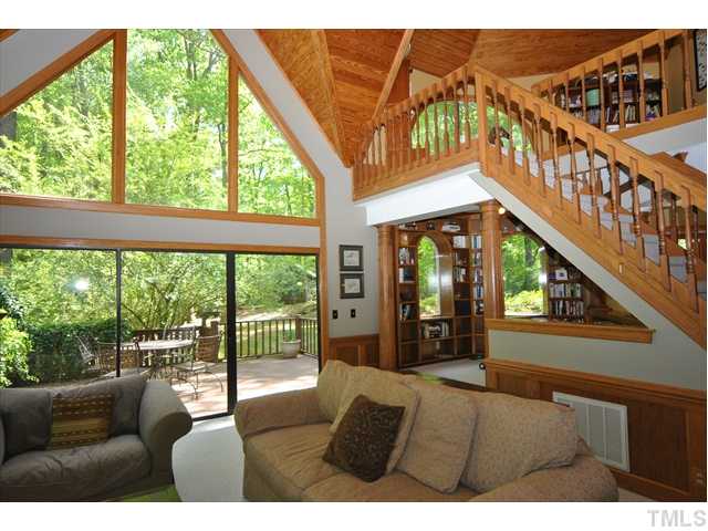 7900 Tulip Circle Raleigh, NC 27606 - Photo 3 of 9 Another view of family room with view of deck thru sliding glass door