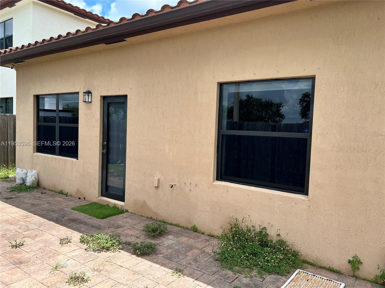 134 Northeast 23rd Terrace Homestead, FL 33033 - Photo 17 of 17 a front view of a house