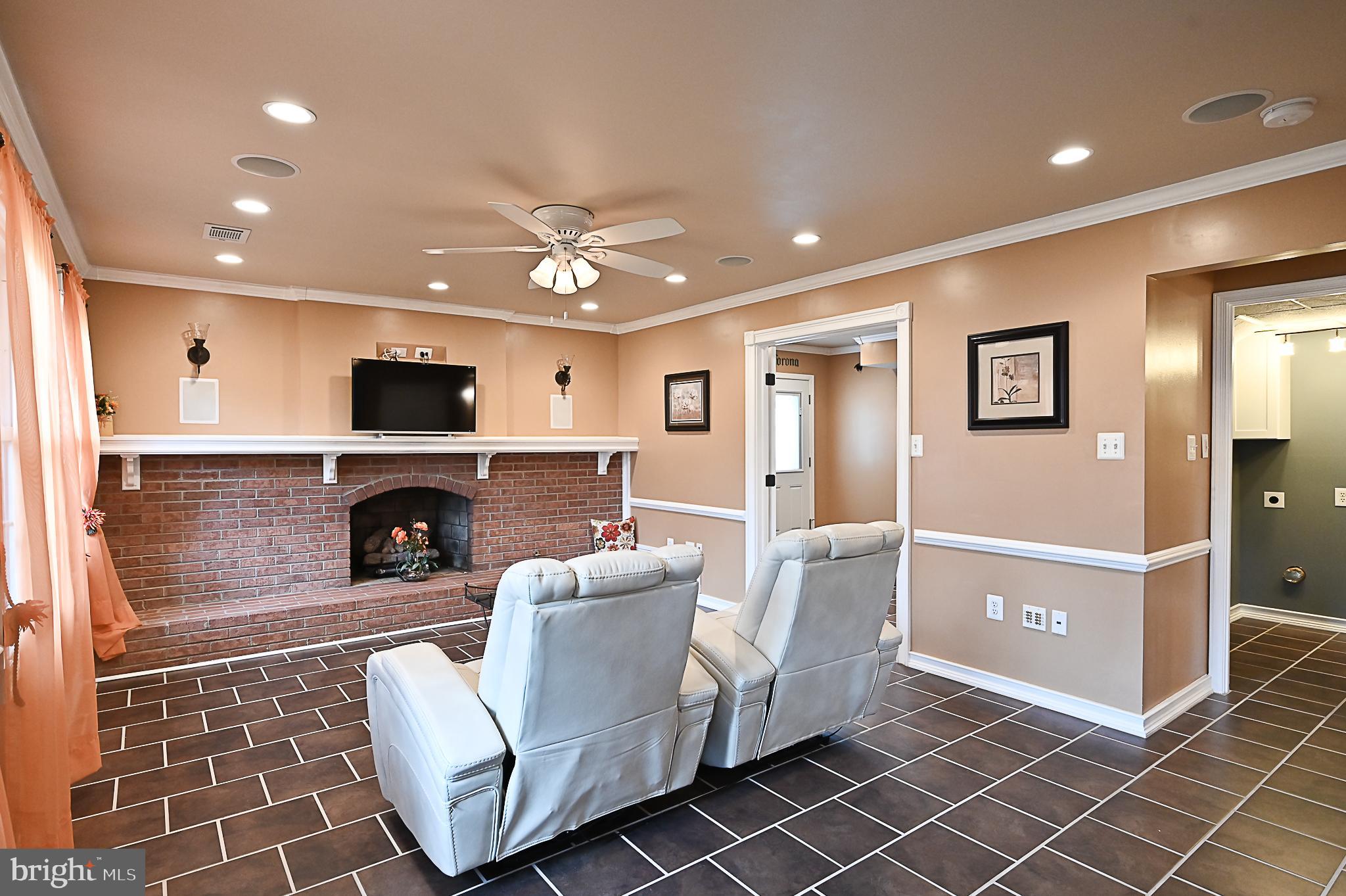 8013 West Point Drive Springfield, VA 22153 - Photo 22 of 35 Lower level family room with tile flooring