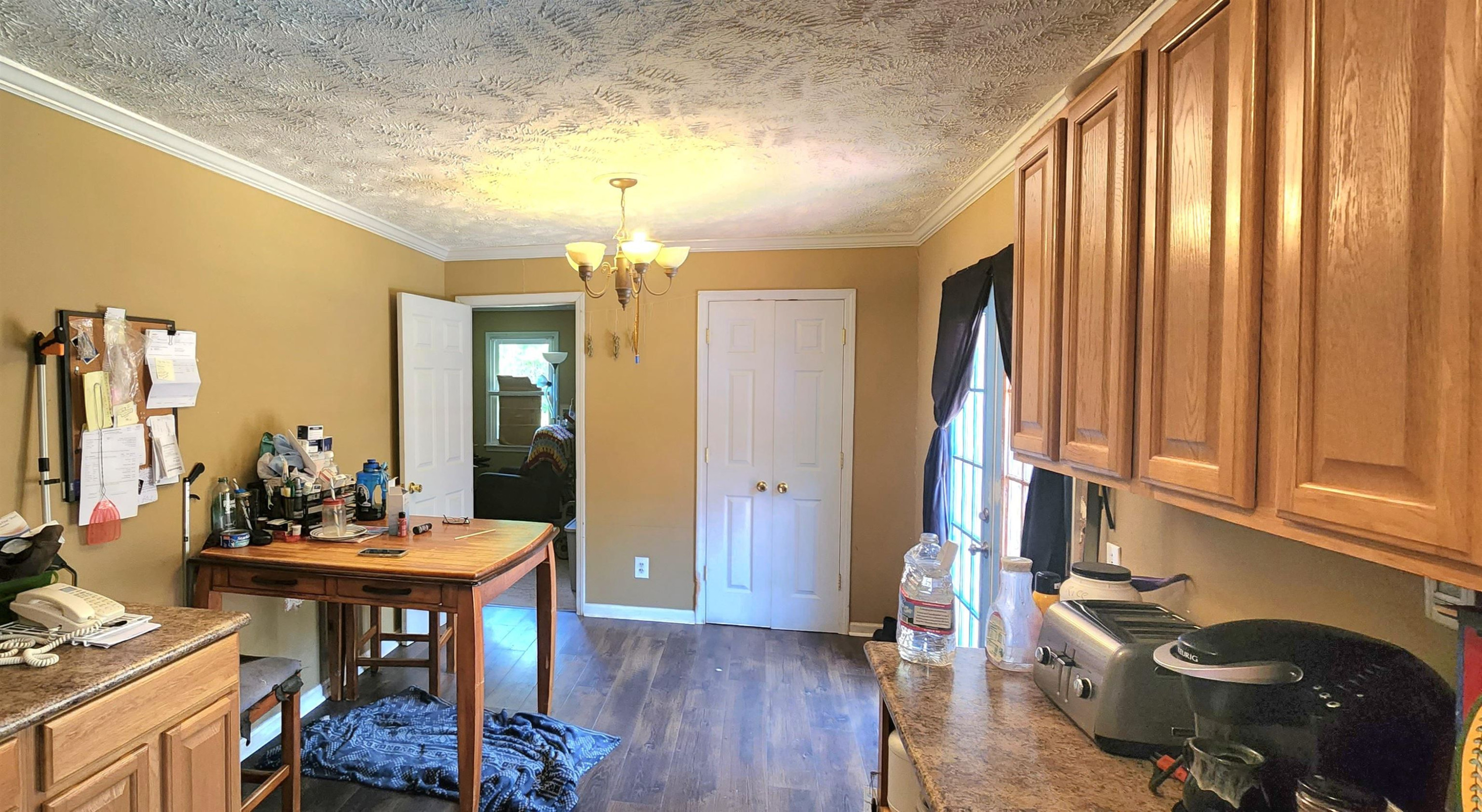 60 McAbee Road Jackson, TN 38301 - Photo 5 of 18 a view of a dining room with furniture and chandelier