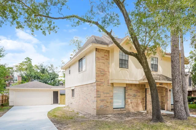a view of livingroom with hardwood floor and kitchen view