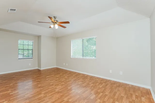 a bathroom with a tub sink and a shower