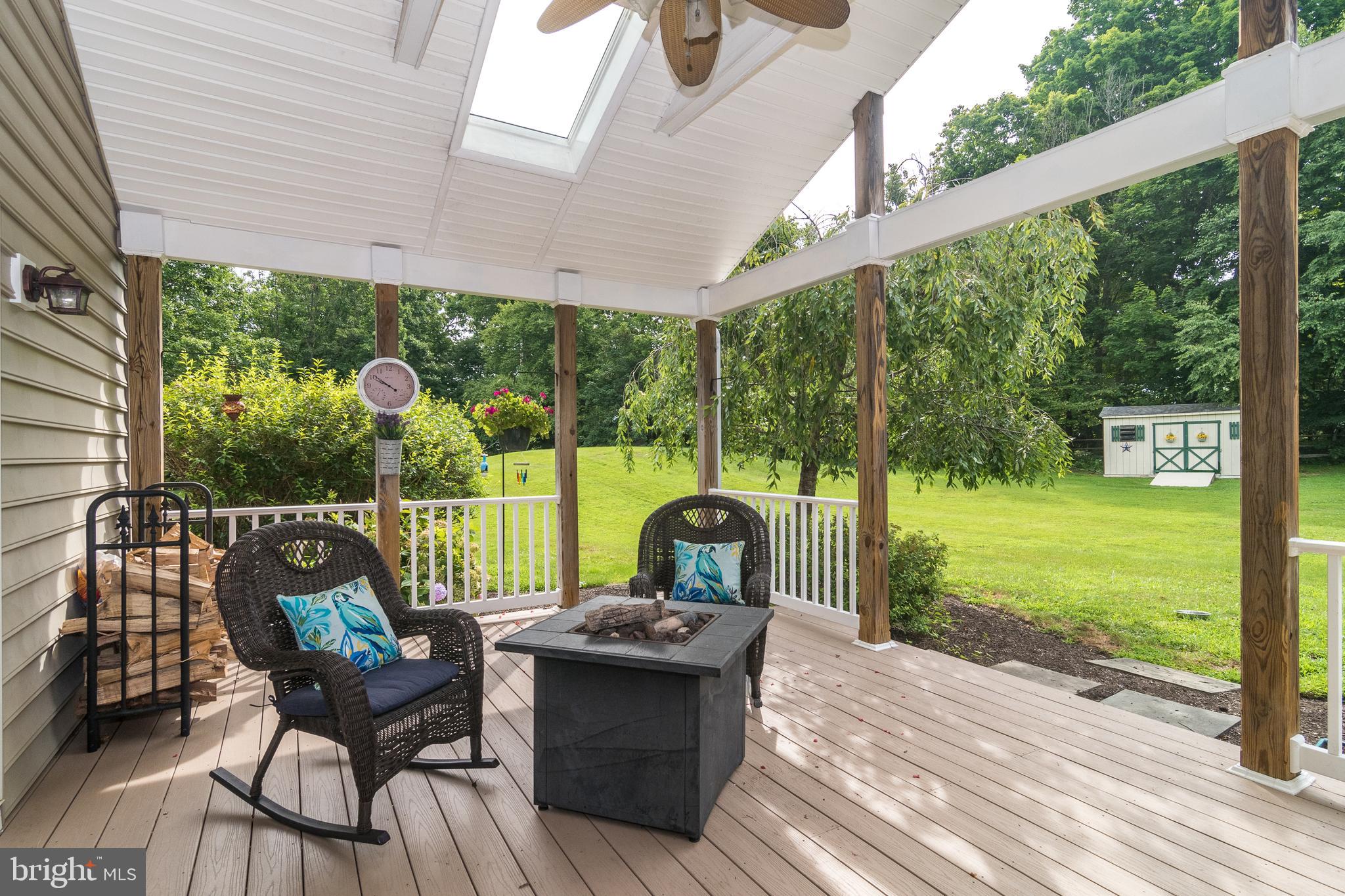 4973 Danielle Drive Doylestown, PA 18902 - Photo 35 of 39 Covered deck with ceiling fan!