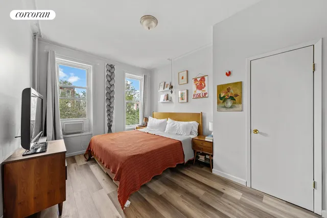 a kitchen with stainless steel appliances granite countertop a refrigerator a stove and a sink