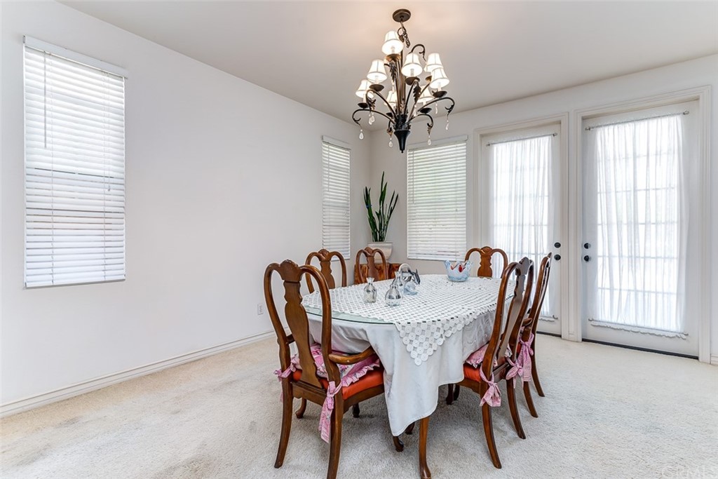 30 Paso Robles Irvine, CA 92602 - Photo 14 of 34 a view of a dining room with furniture window and outside view