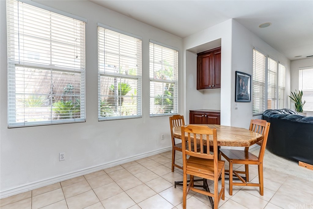 30 Paso Robles Irvine, CA 92602 - Photo 22 of 34 a dining room with furniture and window