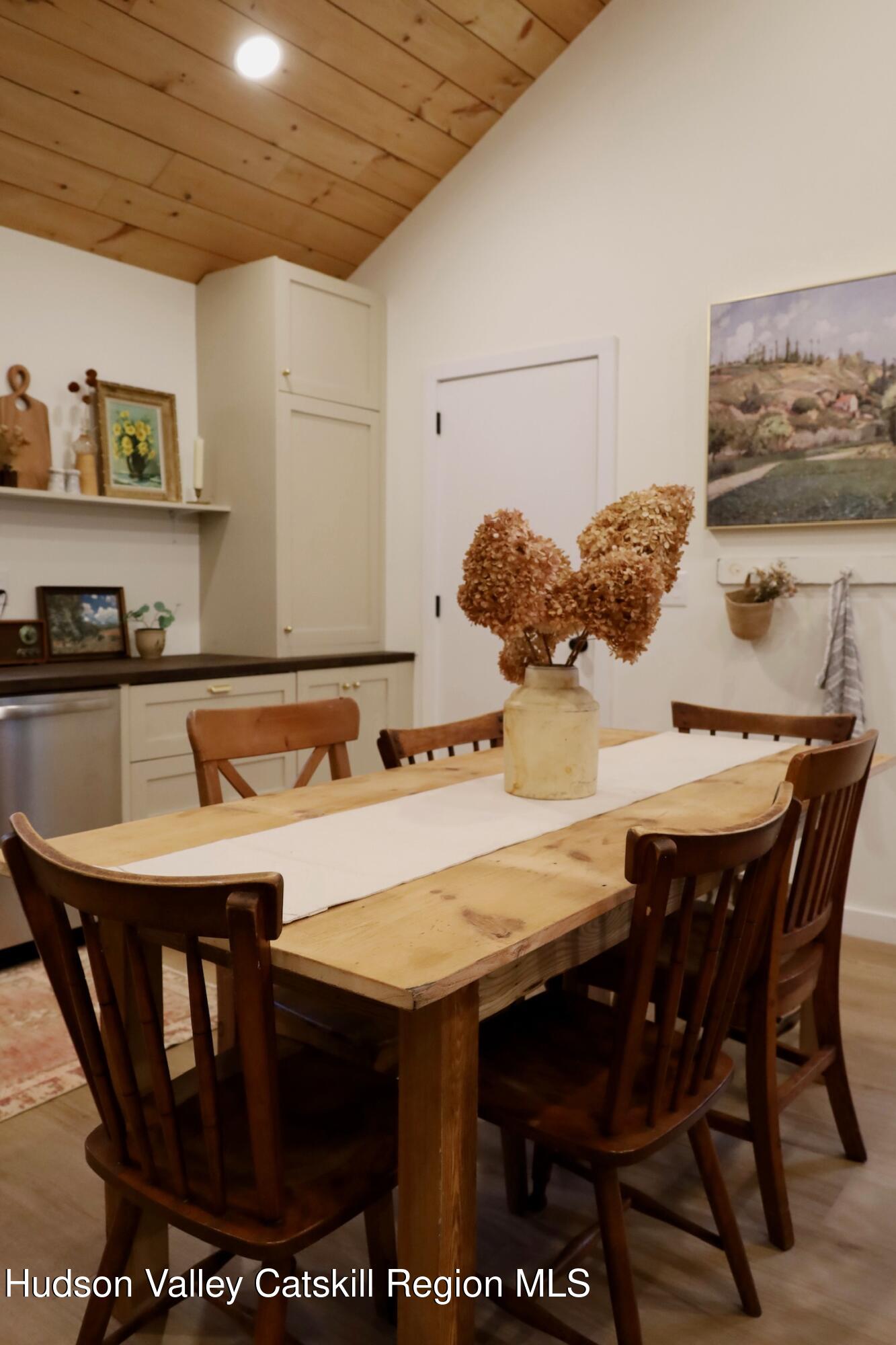 230 Potic Mountain Road Athens, NY 12414 - Photo 9 of 25 a view of a dining room with furniture