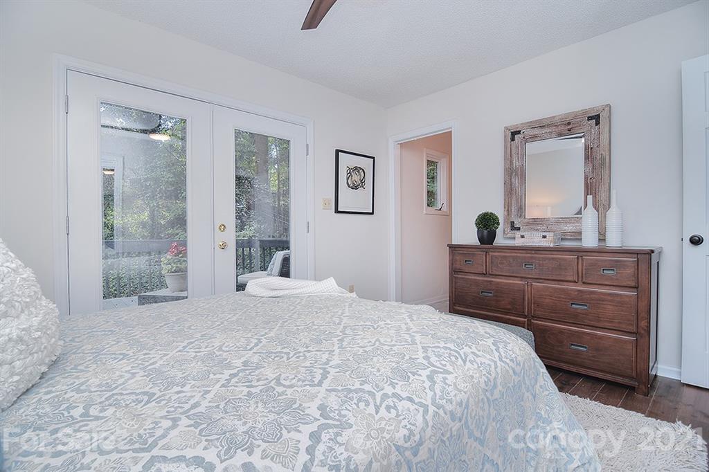 3499 Lake Shore Road South Denver, NC 28037 - Photo 23 of 35 a bedroom with a bed and a dresser