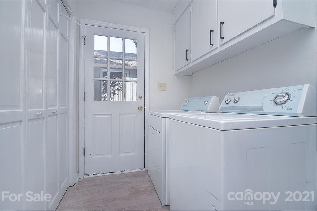 3499 Lake Shore Road South Denver, NC 28037 - Photo 29 of 35 a utility room with dryer and washer