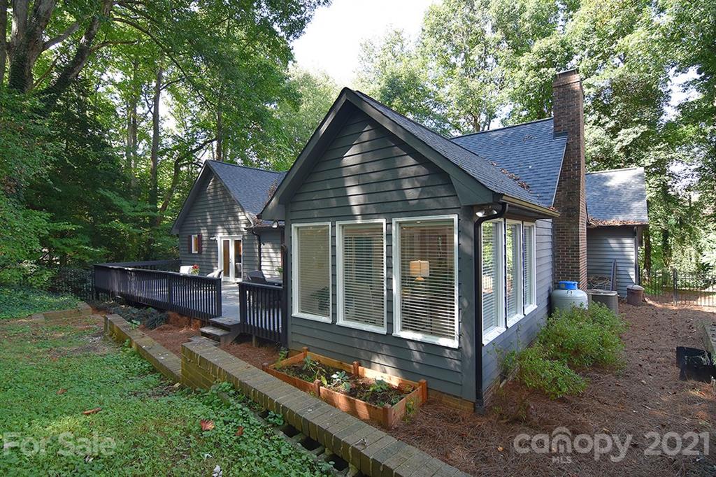 3499 Lake Shore Road South Denver, NC 28037 - Photo 34 of 35 a front view of a house with a yard