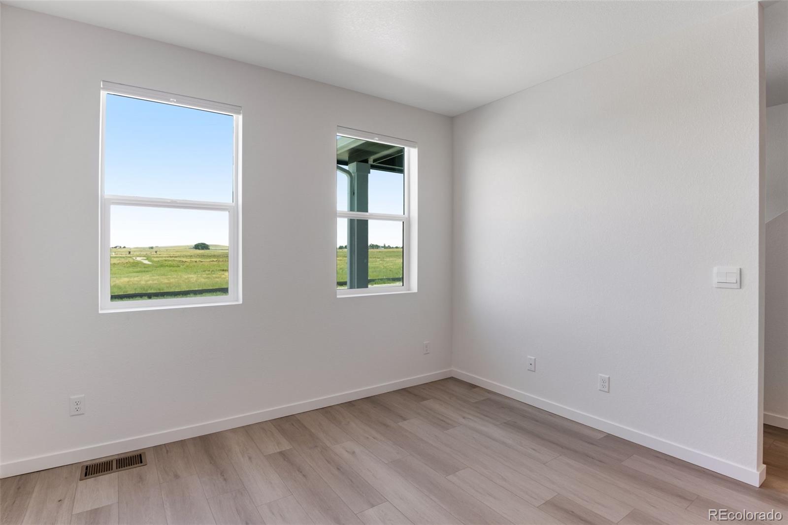 2344 Merlot Street Fort Lupton, CO 80621 - Photo 3 of 23 an empty room with a window