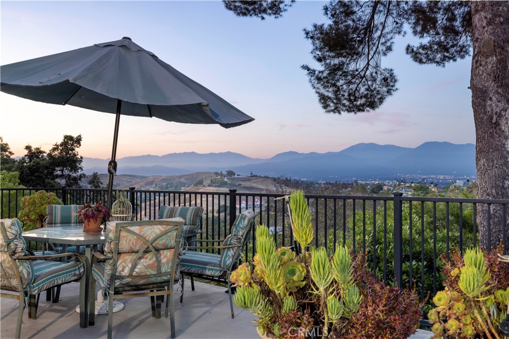 16313 Fox Hunt Road Chino Hills, CA 91709 - Photo 1 of 1 a view of a chairs and table on the terrace