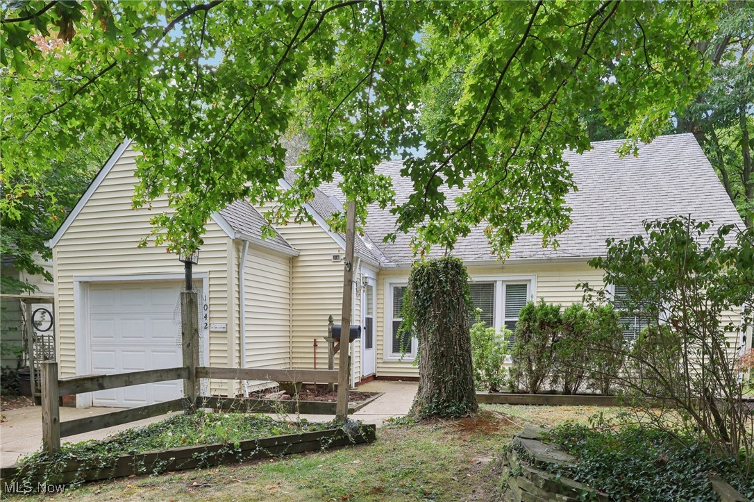 Cape cod-style house with a garage