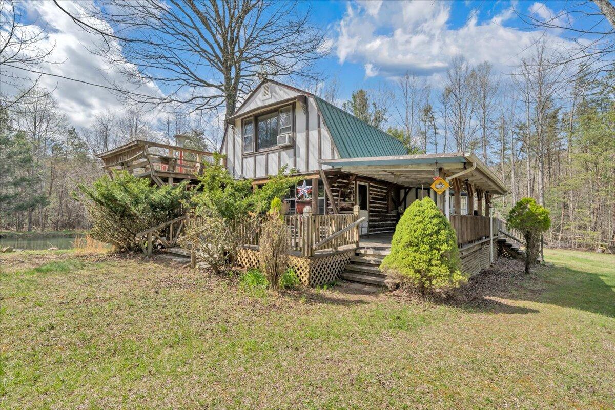 75 Johns Creek Road New Castle, VA 24127 - Photo 45 of 98 a front view of a house with garden
