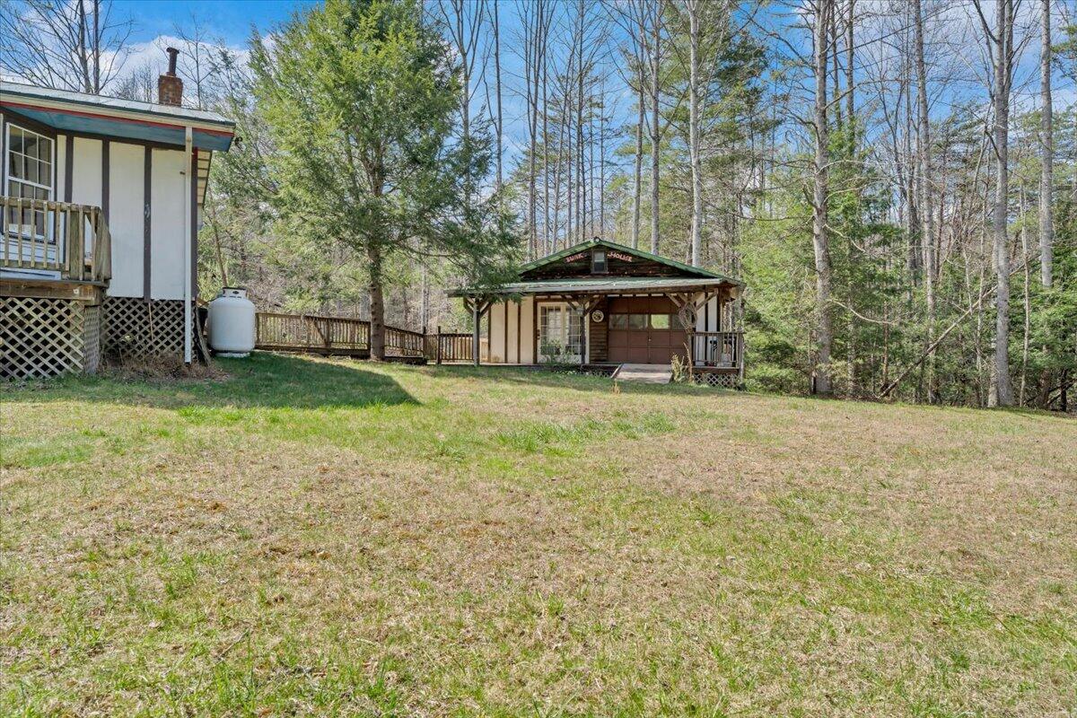 75 Johns Creek Road New Castle, VA 24127 - Photo 49 of 98 a view of a house with backyard and sitting area