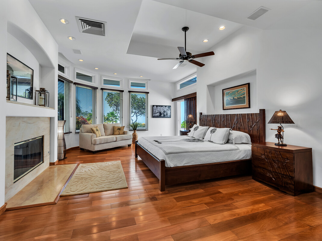 59-128 Olomana Road Kamuela, HI 96743 - Photo 16 of 30 a living room with furniture and a fireplace