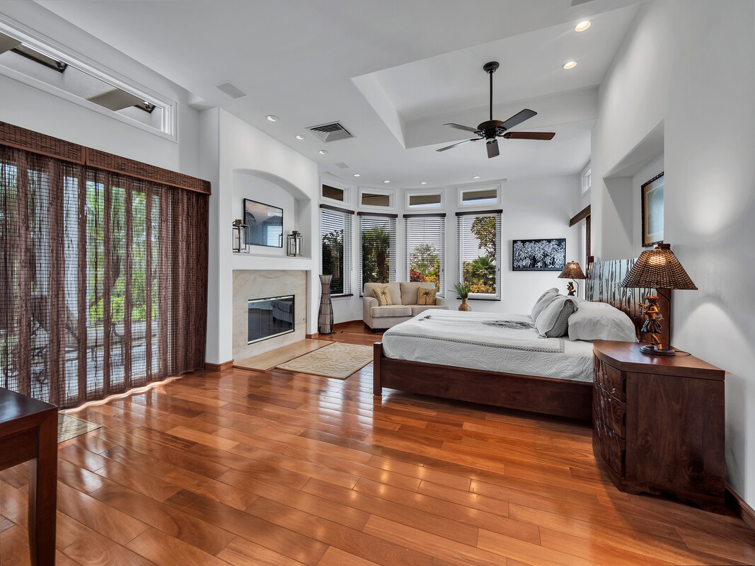 59-128 Olomana Road Kamuela, HI 96743 - Photo 17 of 30 a living room with furniture and a fireplace