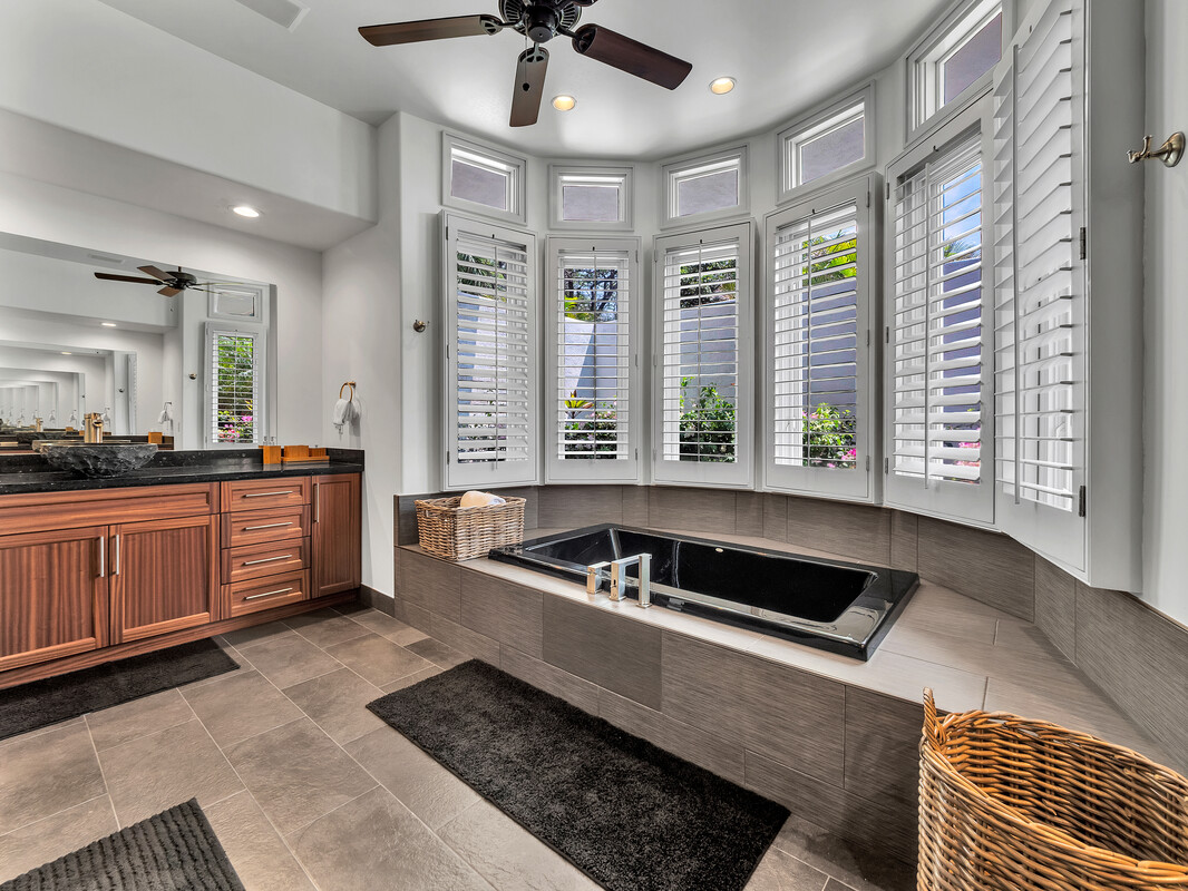 59-128 Olomana Road Kamuela, HI 96743 - Photo 19 of 30 a living room with furniture and a rug
