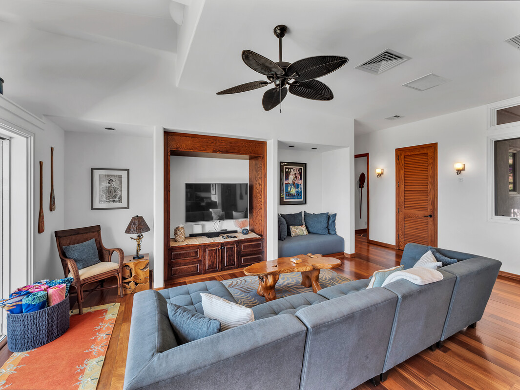 59-128 Olomana Road Kamuela, HI 96743 - Photo 21 of 30 a living room with furniture and a flat screen tv