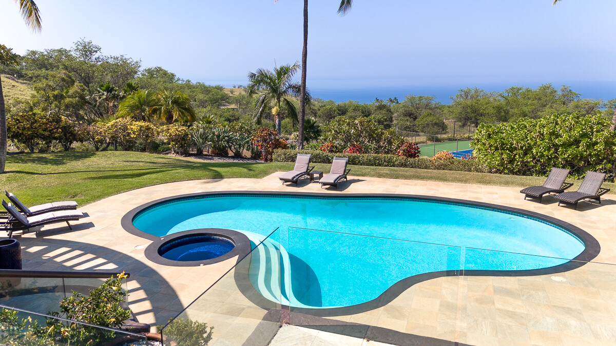 59-128 Olomana Road Kamuela, HI 96743 - Photo 23 of 30 a view of a swimming pool with a yard