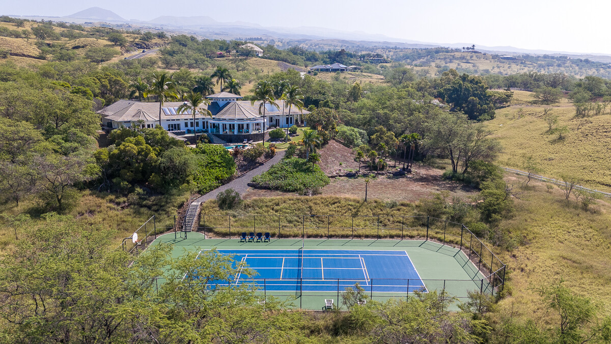 59-128 Olomana Road Kamuela, HI 96743 - Photo 25 of 30 an aerial view of a house with a yard