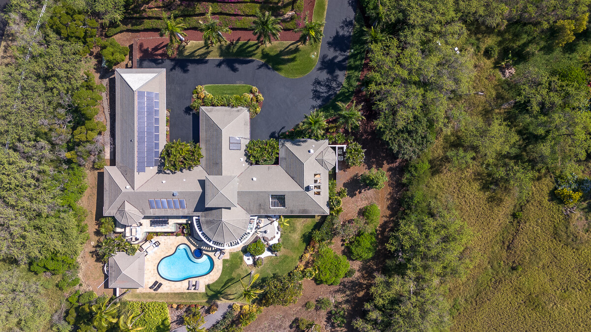 59-128 Olomana Road Kamuela, HI 96743 - Photo 26 of 30 an aerial view of a house with swimming pool and outdoor space