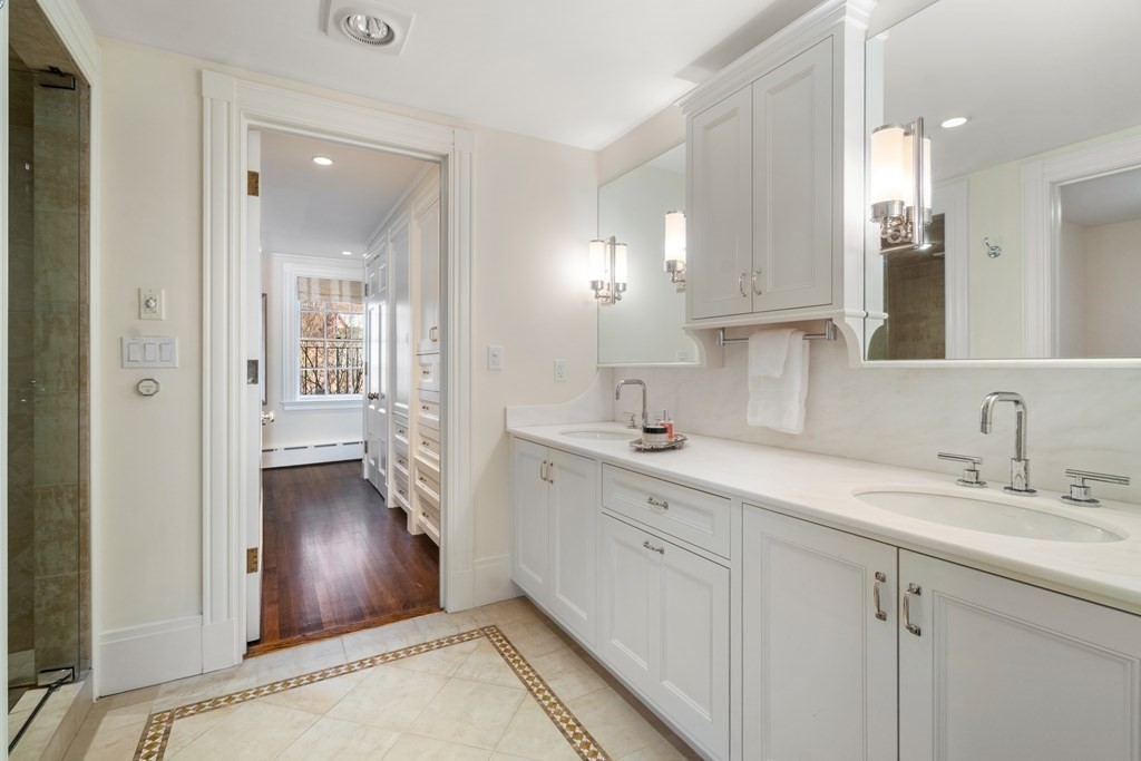 17 West Cedar Street Boston, MA 02108 - Photo 23 of 42 a spacious bathroom with a sink and a mirror