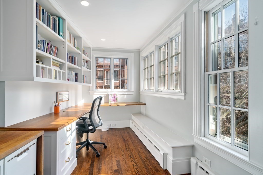 17 West Cedar Street Boston, MA 02108 - Photo 34 of 42 a view of a workspace with furniture and a window
