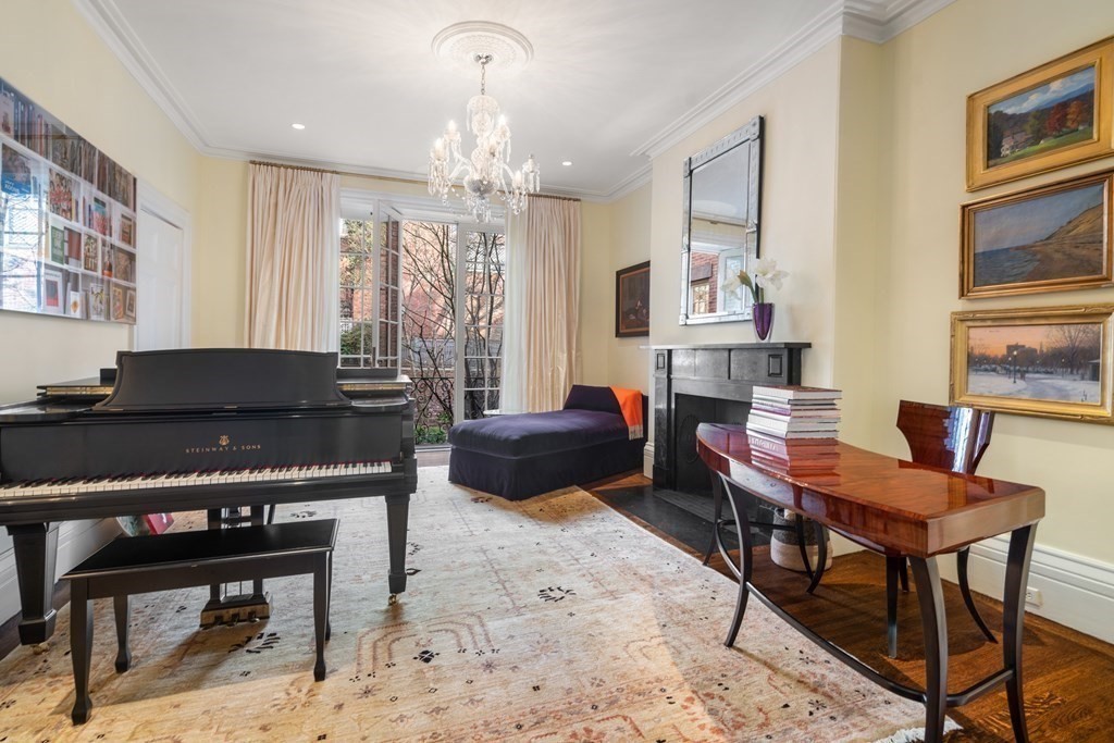 17 West Cedar Street Boston, MA 02108 - Photo 6 of 42 a living room with furniture a piano and a chandelier