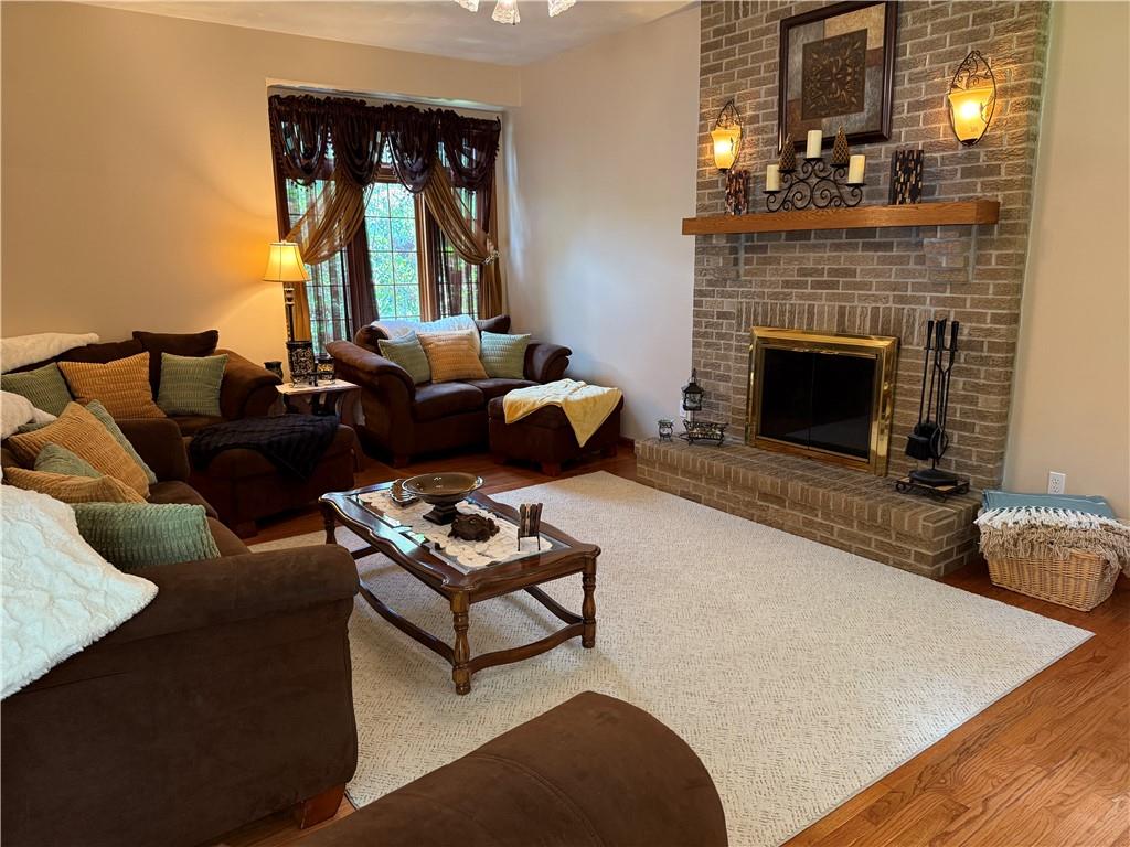 293 Sandy Hill Road Valencia, PA 16059 - Photo 23 of 50 a living room with furniture fireplace and window