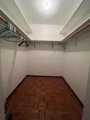 a view of a room with racks on the wall