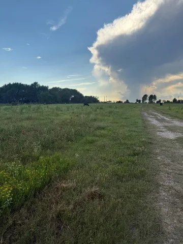 a view of an ocean and mountain