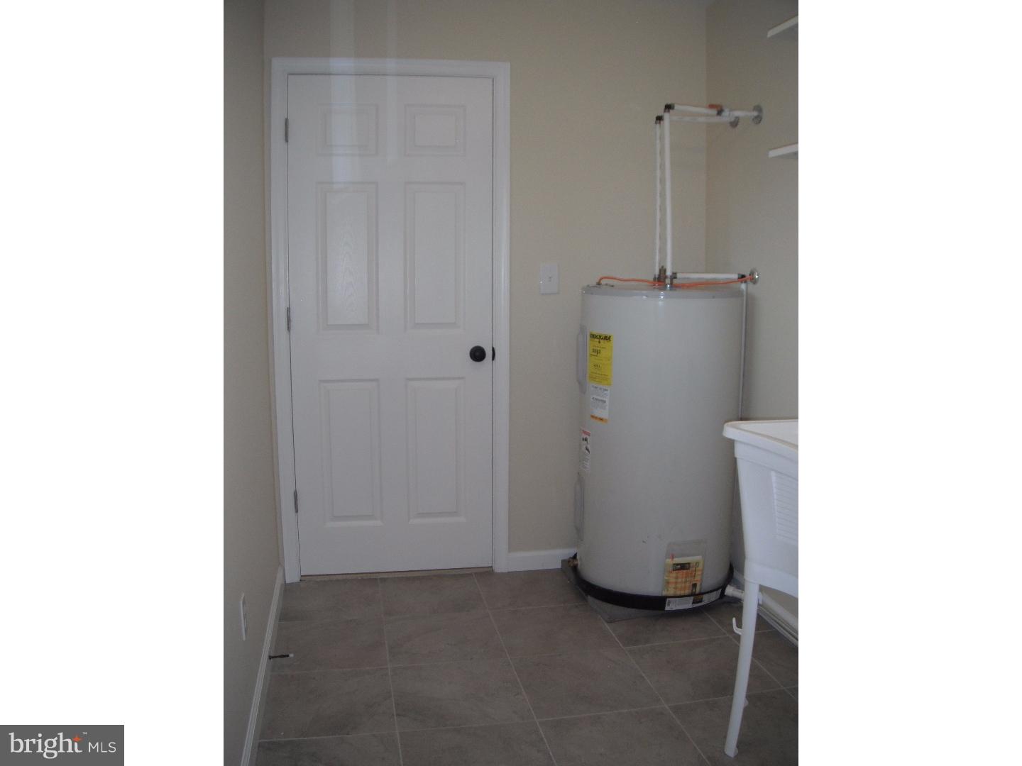 25 Inland Road Levittown, PA 19057 - Photo 15 of 18 Laundry Room