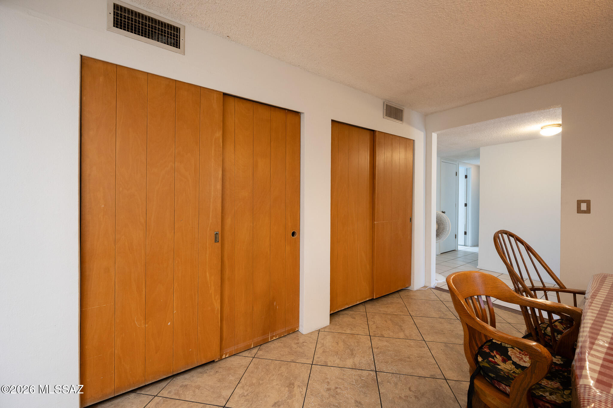 7749 East Pima Street Tucson, AZ 85715 - Photo 6 of 21 Dinning rm storage DSC_4730
