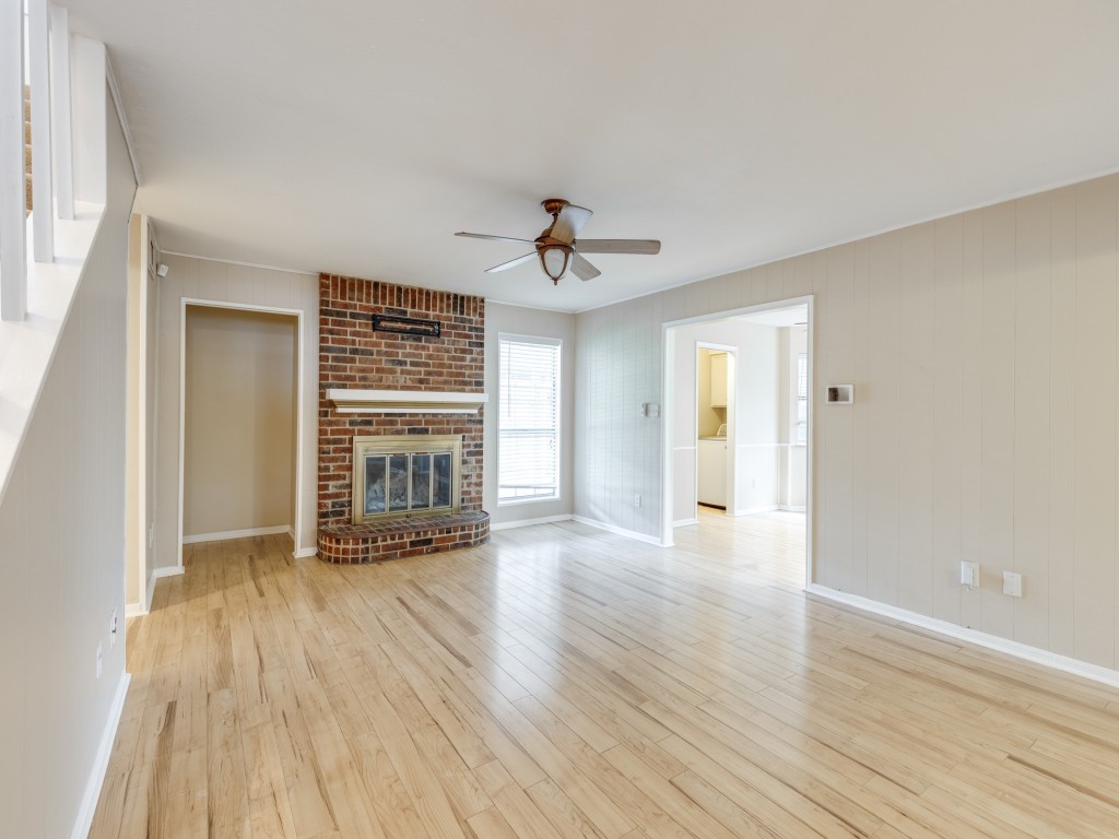 2403 Pecan Wood Lane Rosenberg, TX 77471 - Photo 7 of 25 wooden floor in an empty room with a window