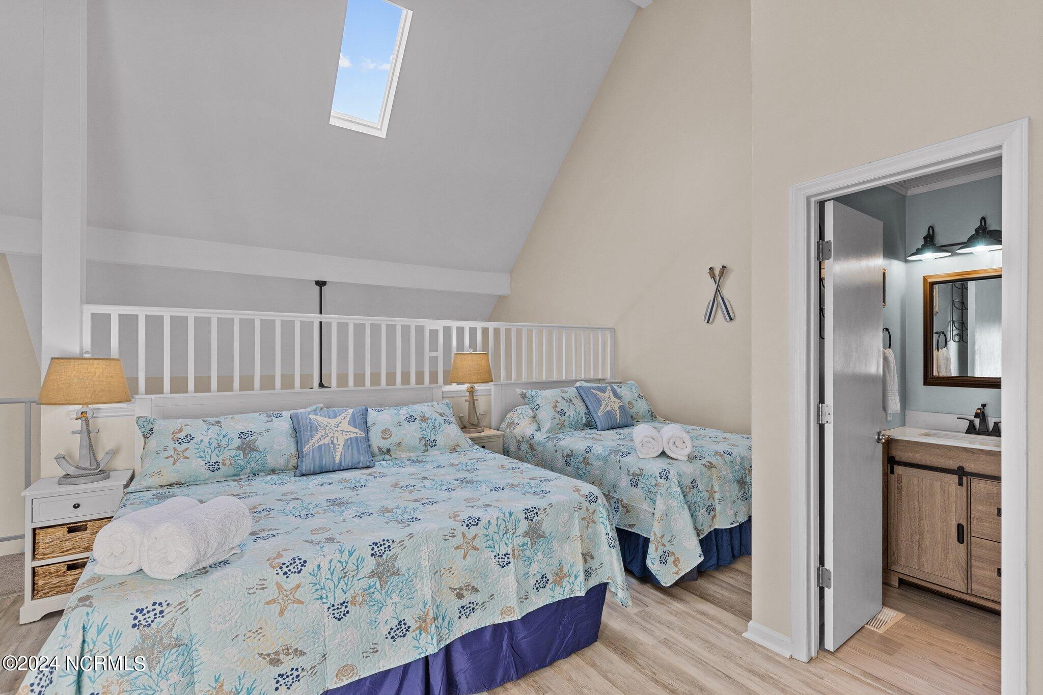 9201 Coast Guard Road, Unit G204 Emerald Isle, NC 28594 - Photo 20 of 40 loft bedroom