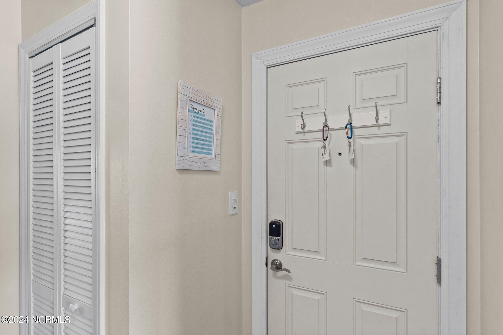 9201 Coast Guard Road, Unit G204 Emerald Isle, NC 28594 - Photo 2 of 40 front door