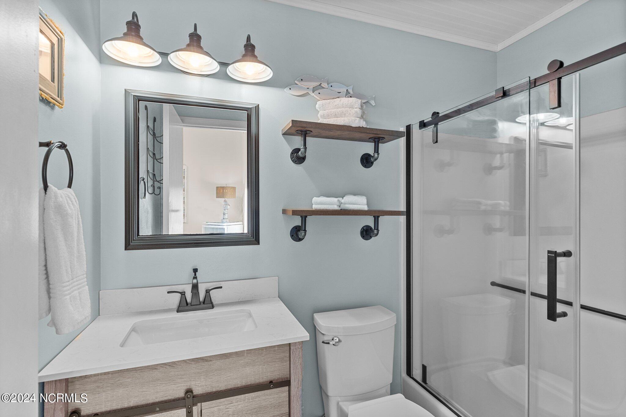 9201 Coast Guard Road, Unit G204 Emerald Isle, NC 28594 - Photo 22 of 40 bathroom