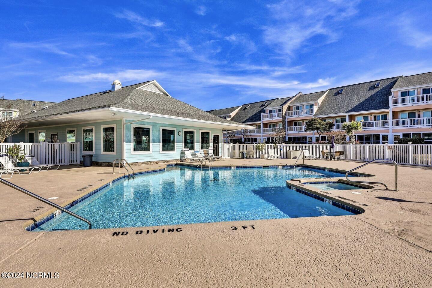 9201 Coast Guard Road, Unit G204 Emerald Isle, NC 28594 - Photo 27 of 40 pool courtyard
