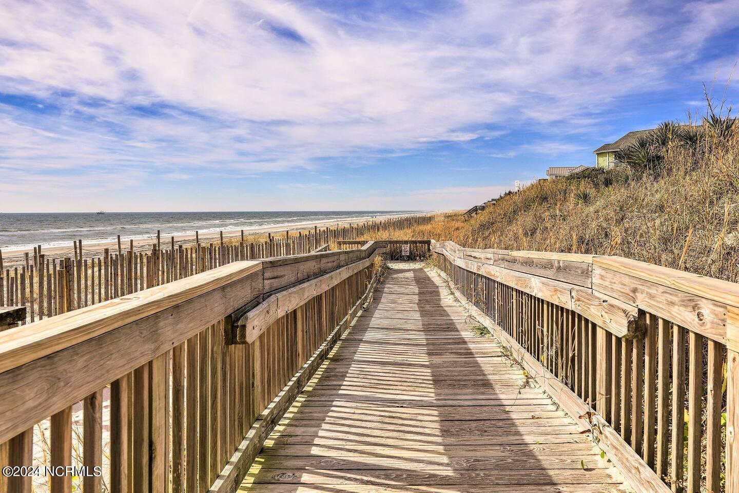 9201 Coast Guard Road, Unit G204 Emerald Isle, NC 28594 - Photo 34 of 40 boardwalk ramp to beach