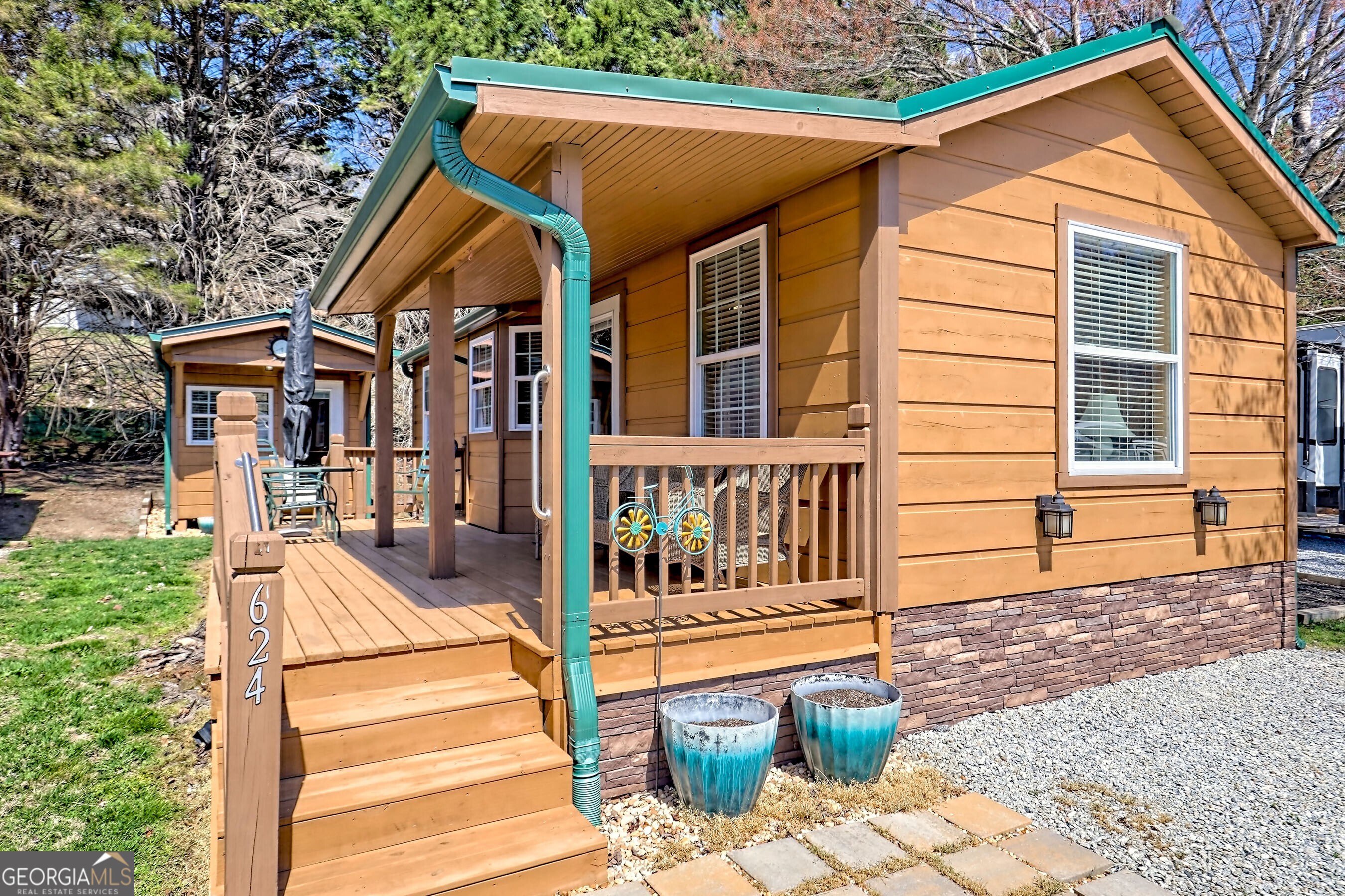 624 River Vista Drive Dillard, GA 30537 - Photo 1 of 1 a view of a house with wooden fence