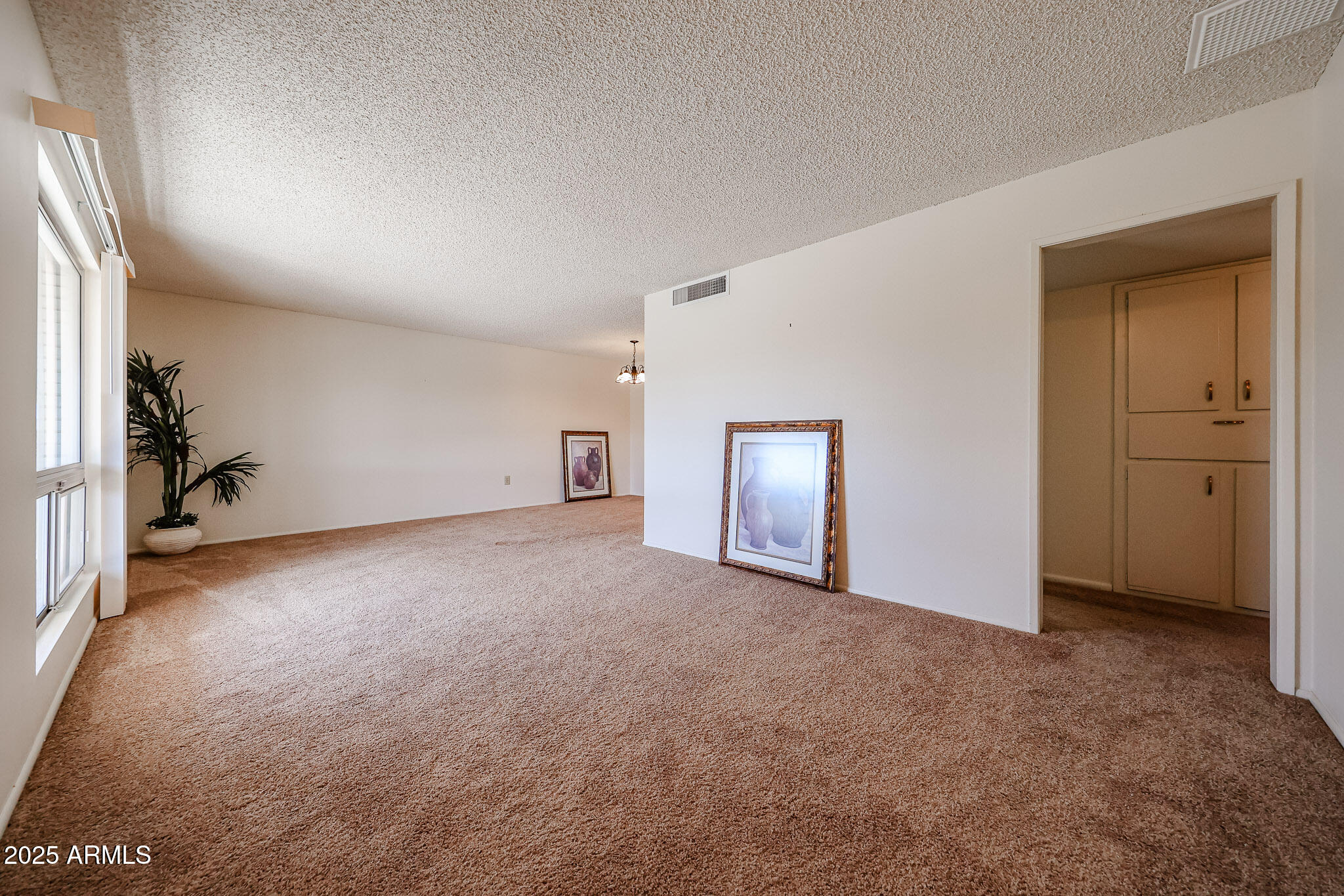 10326 West Pleasant Valley Road Sun City, AZ 85351 - Photo 3 of 25 a view of empty room