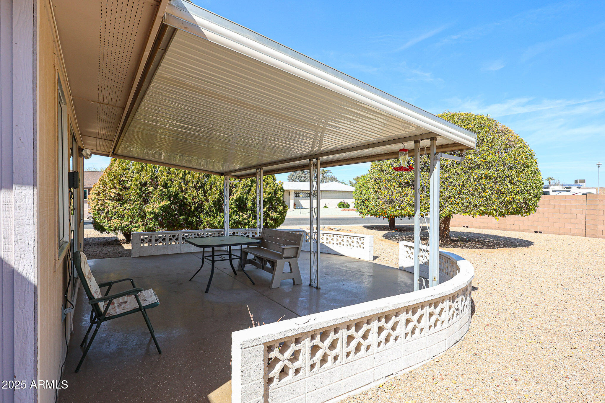 10326 West Pleasant Valley Road Sun City, AZ 85351 - Photo 5 of 25 swimming pool view with a garden space