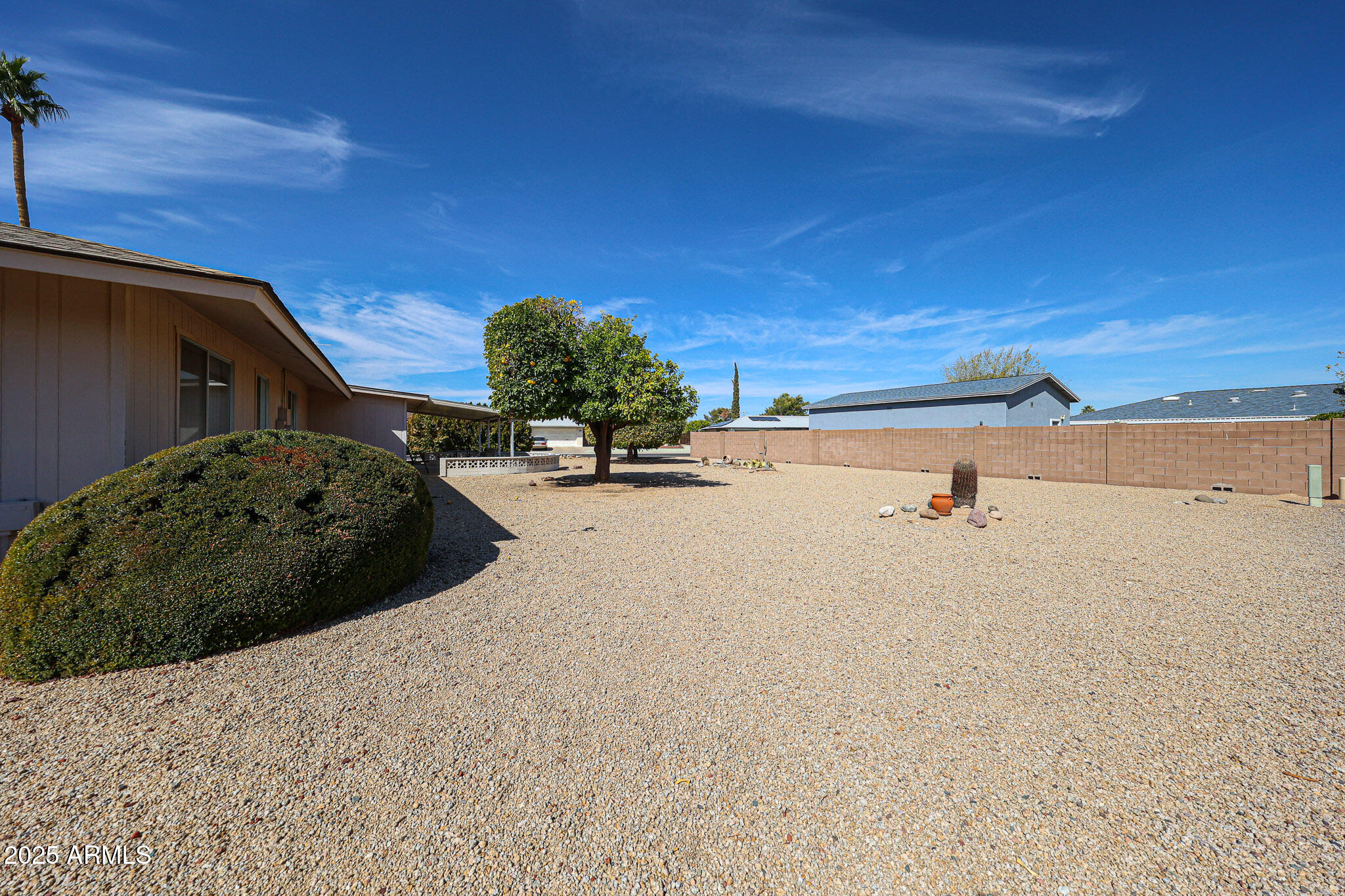 10326 West Pleasant Valley Road Sun City, AZ 85351 - Photo 7 of 25 a view of a back yard of the house