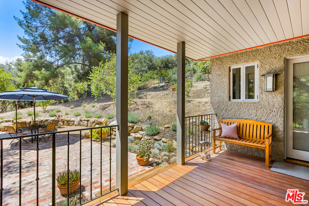 635-637 Greenleaf Canyon Road Topanga, CA 90290 - Photo 18 of 52 a view of a two chairs in the balcony