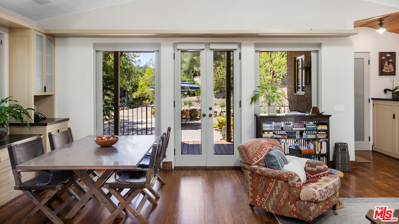 635-637 Greenleaf Canyon Road Topanga, CA 90290 - Photo 20 of 52 a living room with furniture and a window