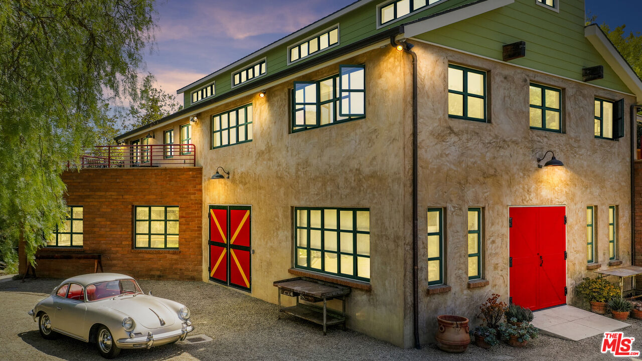 635-637 Greenleaf Canyon Road Topanga, CA 90290 - Photo 48 of 52 a car park in front of a brick house