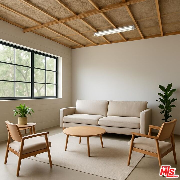 635-637 Greenleaf Canyon Road Topanga, CA 90290 - Photo 6 of 52 a living room with furniture and a window