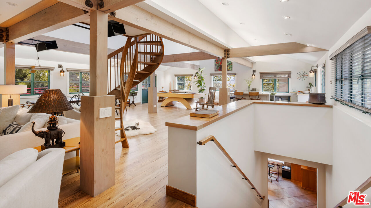 635-637 Greenleaf Canyon Road Topanga, CA 90290 - Photo 10 of 52 a very nice looking living room with a large window and wooden floor