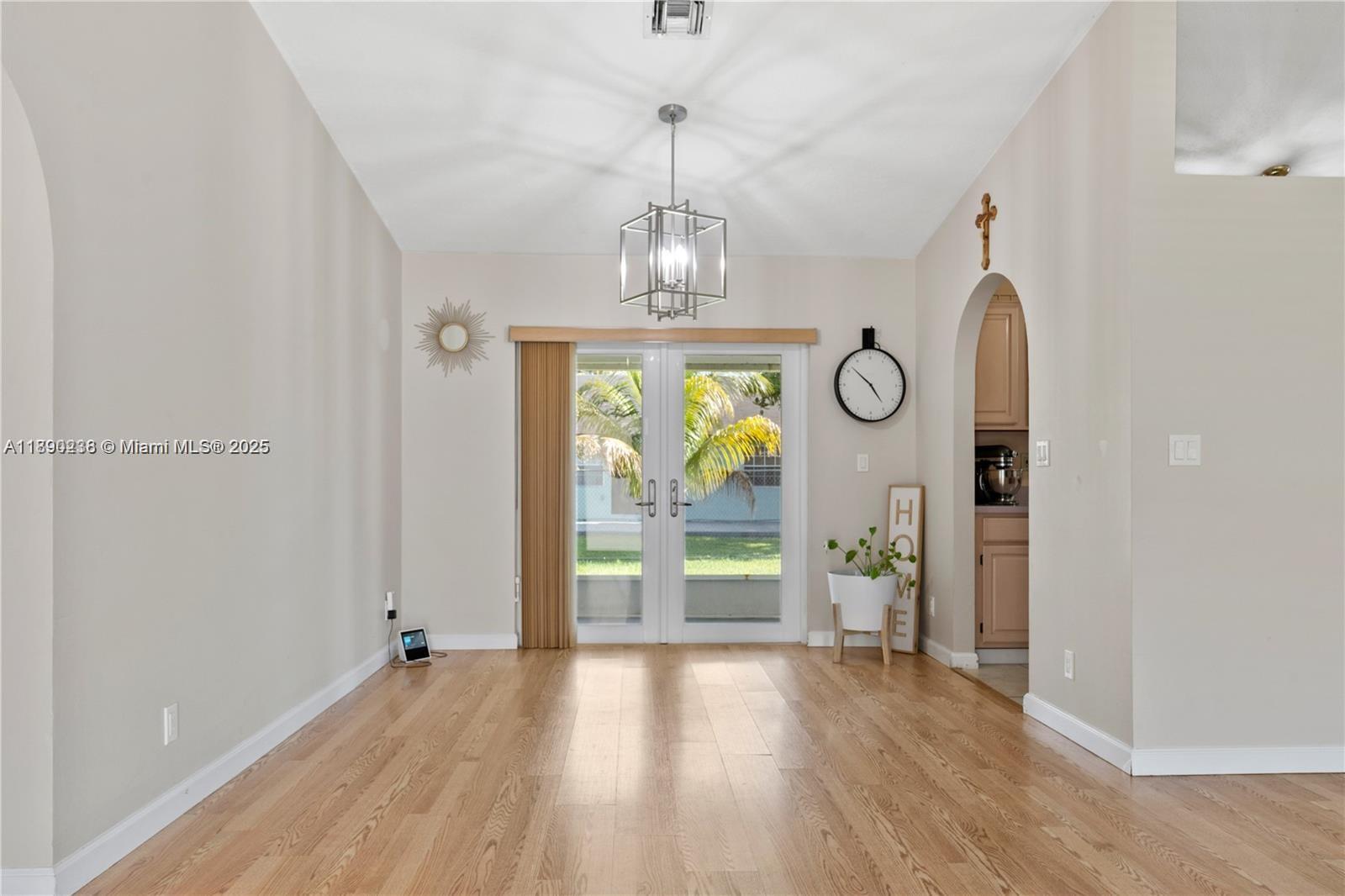 13752 Southwest 285th Street Homestead, FL 33033 - Photo 15 of 25 wooden floor in an empty room with a window